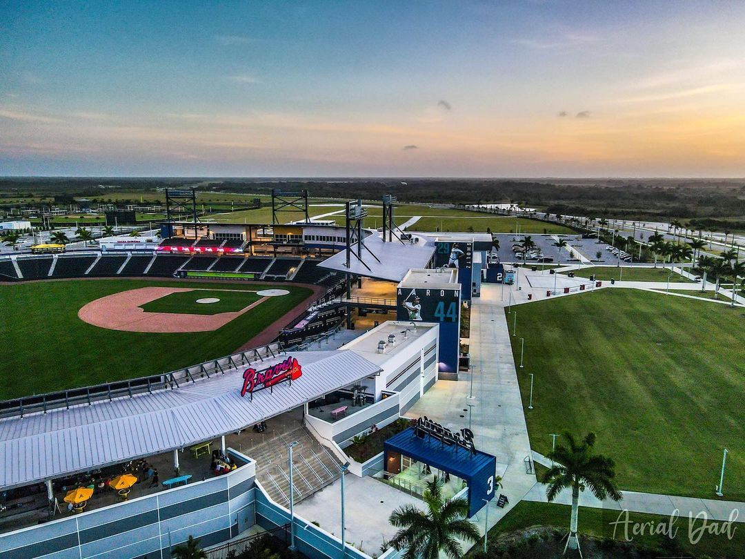 A baseball field with a lot of people in it