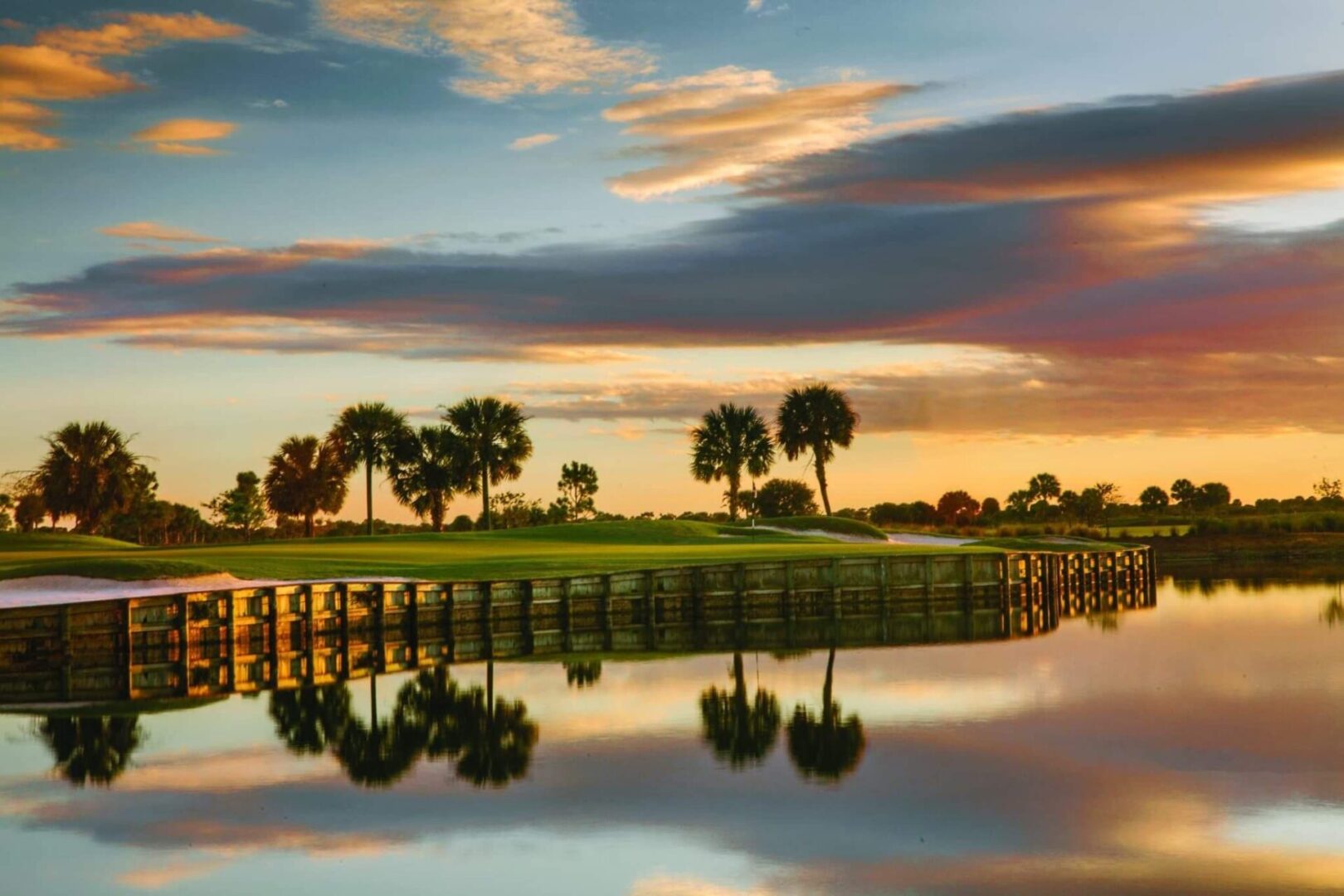 A view of the golf course from across the water.